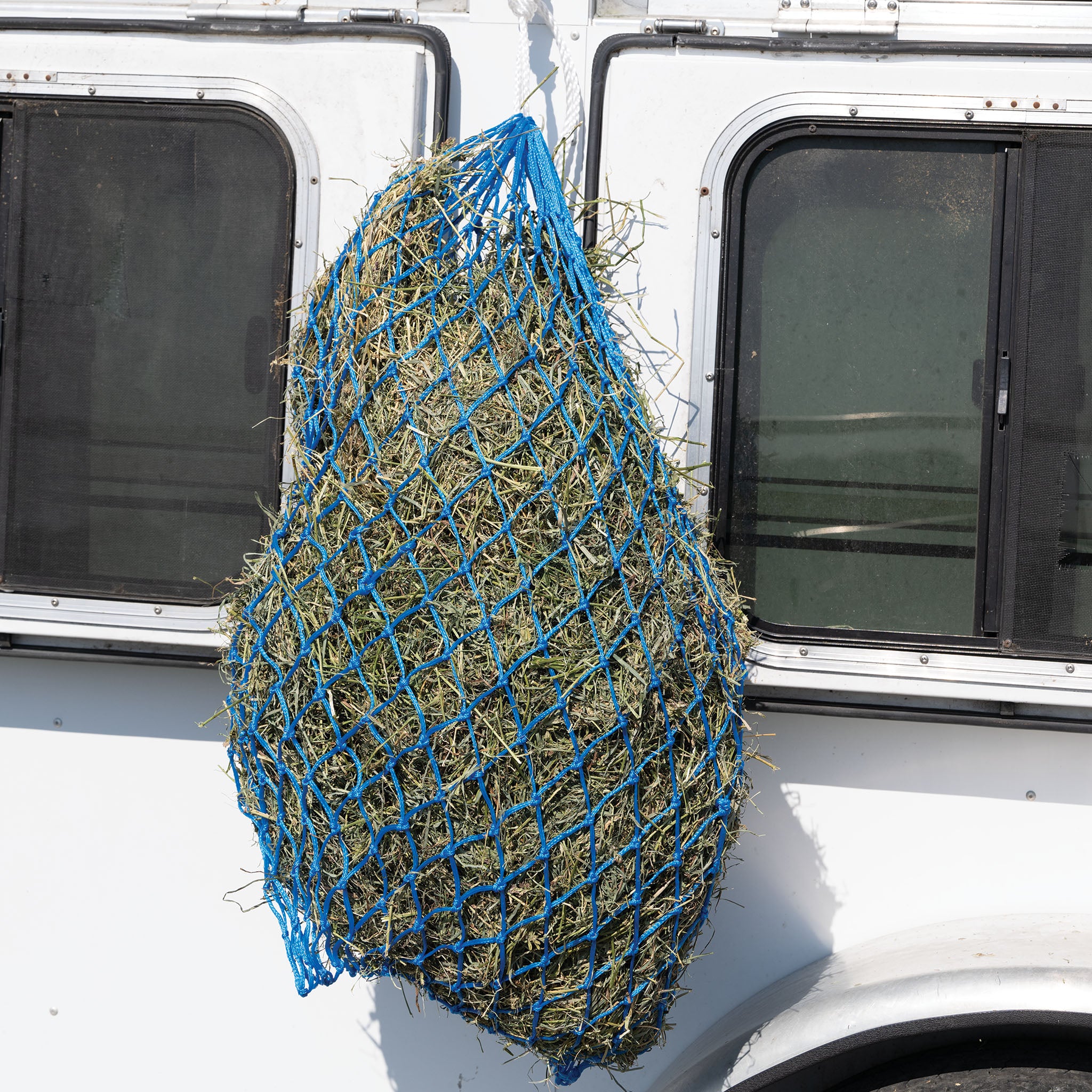 Showman 24801 Knotted Rope Slow Feed Hay Net With Drawstring - Blue/Green/Pink/Purple/Red