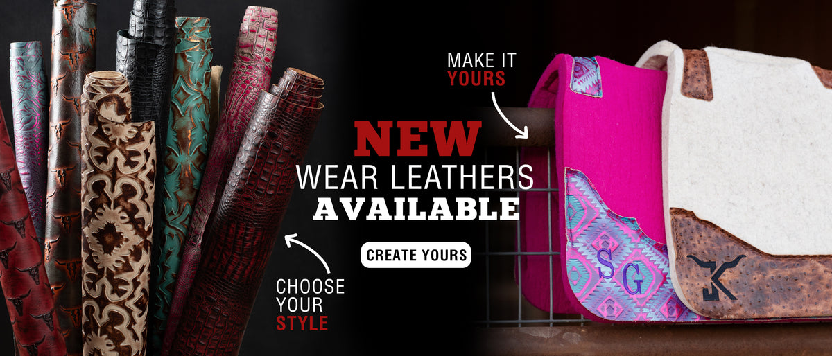 New wear leathers for custom saddle pads, featuring colorful patterned leather options and pink and cream pads with personalized initials.
